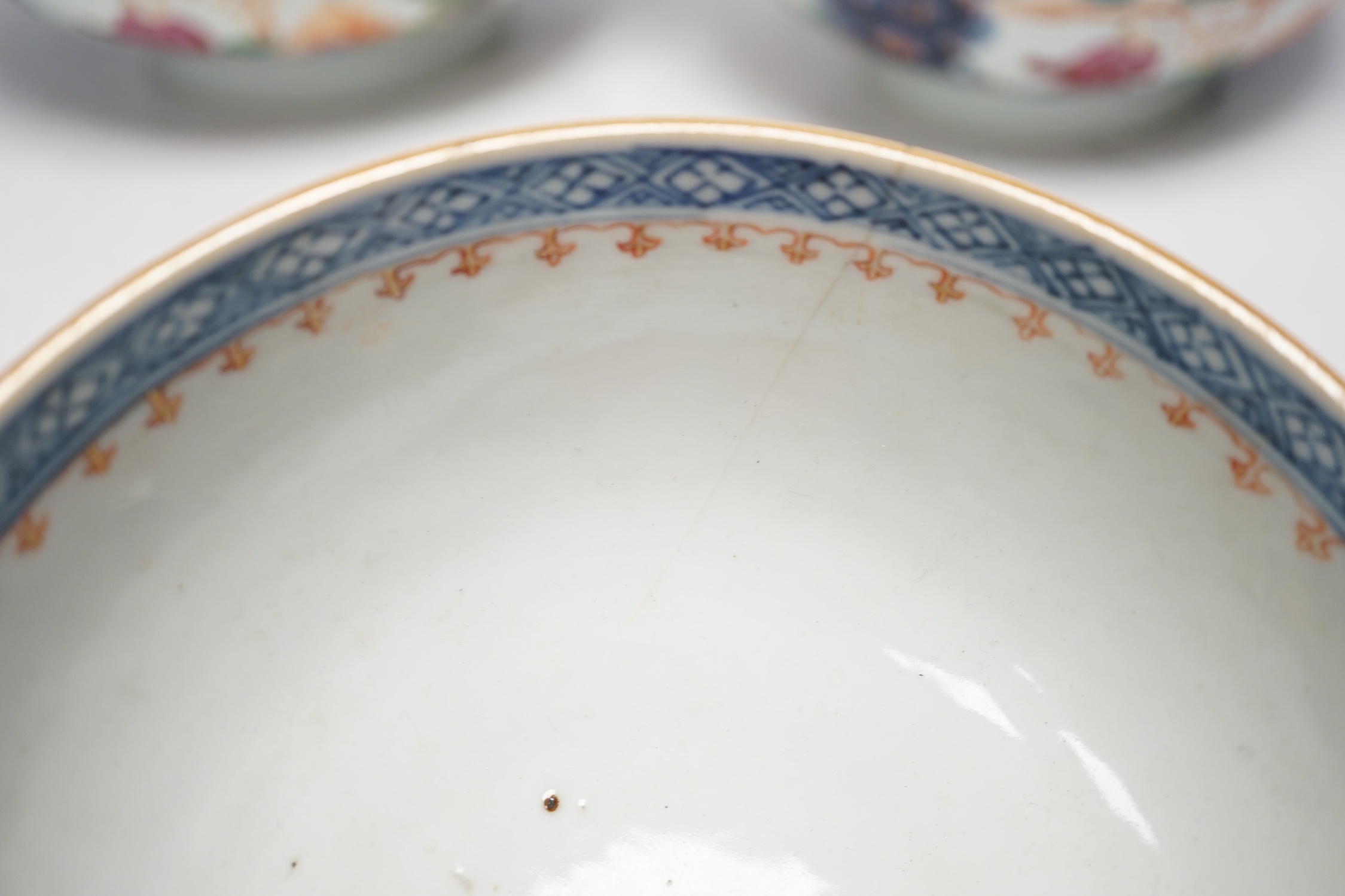 A set of three graduated 18th century Chinese export porcelain bowls, largest 23cm in diameter. Condition - two good, smallest example cracked